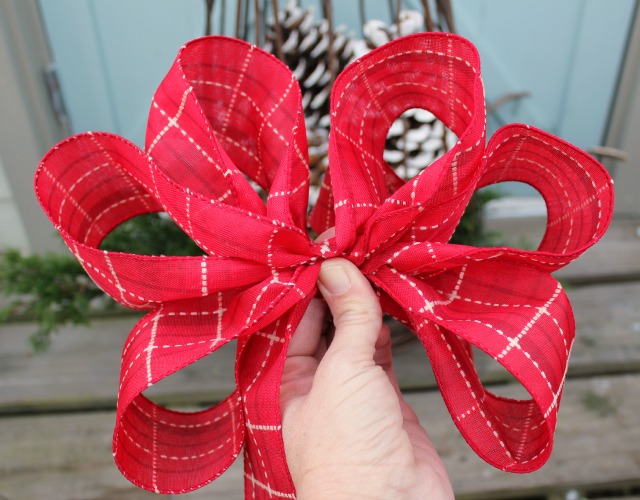 how to make a bow for a christmas tree, christmas decorations, crafts, seasonal holiday decor, Make as many loops as you need to get the size bow you want