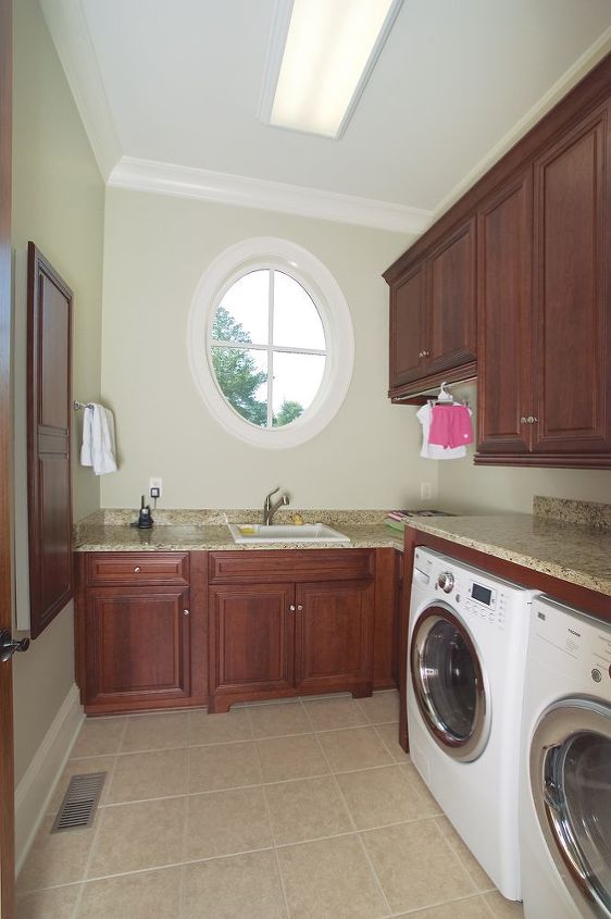 could these luxurious laundry rooms actually make doing laundry fun, laundry room mud room, Downstairs Laundry Room