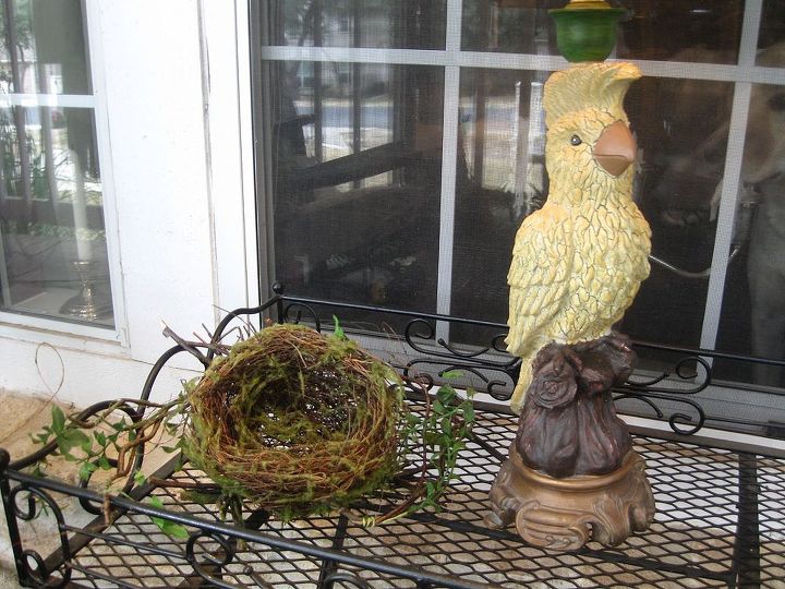 spring porch, curb appeal, porches, seasonal holiday decor, wreaths, I added a new lamp and a barren nest that will be adorned more with eggs and bunnies as the season moves on