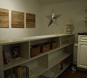 tiny attic apartment, home decor, organizing, urban living, wall decor, woodworking projects, The wall art was a pinterest inspired project using leftover wood from the back wall