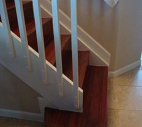 new floors installation, flooring, stairs, Bottom step