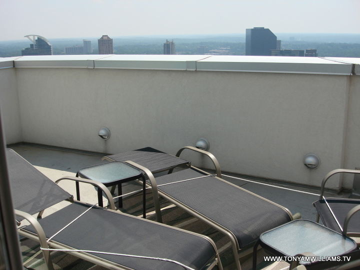 does anyone live in a high rise a condo with a small patio how have you enhanced, decks, outdoor furniture, outdoor living, painted furniture, patio, urban living, Patio furniture tied together so they dont blow off the balcony