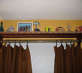 erins room makeover she s 10 and has always loved animals, bedroom ideas, home decor, Custom window treatments courtesy ME covered a piece of MDF in leopard print fabric and placed on brackets w a whole cut through and a dowel We even sewed the panels ourselves she helped this is a lost space that now holds treasures not to be handled too much