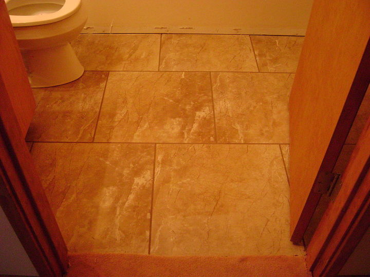 one broken piece of tile at a time this job took 5 days, bathroom ideas, kitchen design, tiling, 18x18 Porcelain tile stagger or brick lay pattern bathroom 2