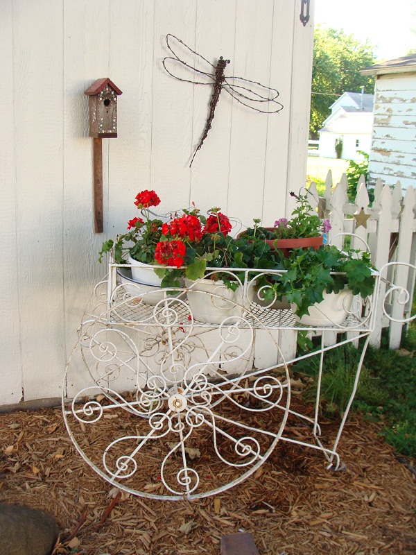 q how would you go about restoring the finish on this old metal flower cart paint, flowers, gardening, painted furniture, My vintage flower cart