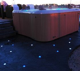 picture of 10 white amp 12 blue skyfuel 2 diameter round solar led landscape, lighting, outdoor living, pool designs, spas, 10 White and 12 Blue Skyfuel 2 diameter round solar LED landscape lights installed in concrete around a hot tub spa Install these yourself in minutes with some common household tools