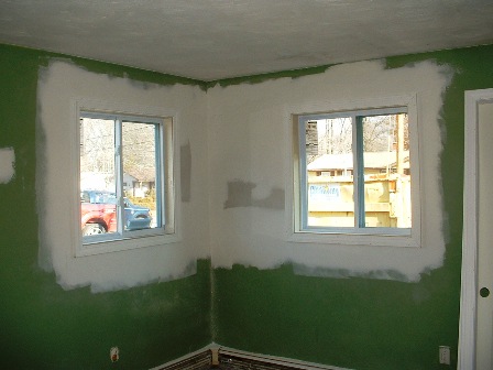 ranch flip brockton ma, New windows installed taped and seamed with trim installled