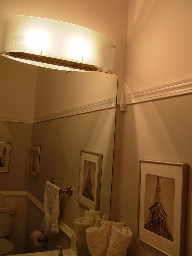 my favorite transformation from builder blah to remodel revamp on a budget, bathroom ideas, home decor, After New light fixture before it was a row bulb fixture