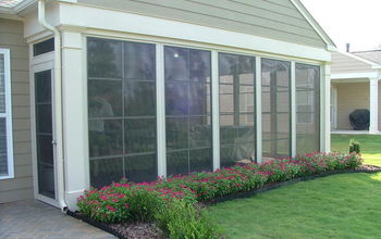 Pgt E-Z Breeze Sliding panels installed on screen porch to create all season room