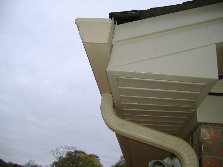 i hired home improvement store to do my fasica gutter and downspouts in tan color, curb appeal, painting, notice 3 different colors in tan color