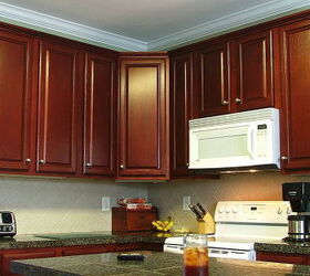 Cathy saved $30,000 by Refinishing her Kitchen Cabinets instead of replacing them!
