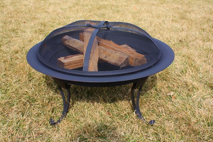 repaint an old firepit, outdoor living, painting, Repainting an old fire pit with high heat spray paint