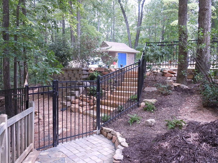 my retaining wall and partial pool deck renovation is 90 complete the contractor, decks, fences, outdoor living, pool designs, Fence replaced stored plantings replaced new plantings added and work ongoing on entryway