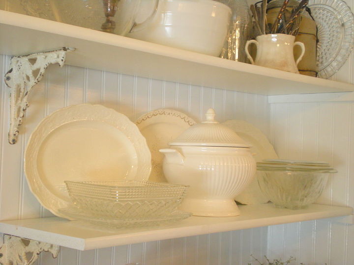 A little styling makes open shelving beautiful and functional. No more wondering where something is--you can see it all. Not show:Even my pantry cupboard has glass doors--I can see at a glance what I need to pick up at the market. I will say I am super OCD and make sure all my labels face forward. I even buy the store brand from one grocery store of all my canned goods because the packaging looks vintage.