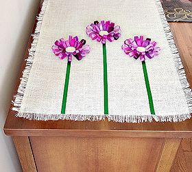 no sew loopy ribbon flower burlap tablerunner, crafts, Attach the stems starting at the fringe using fabric glue for a smooth fit and next glue the blooms for a finish look