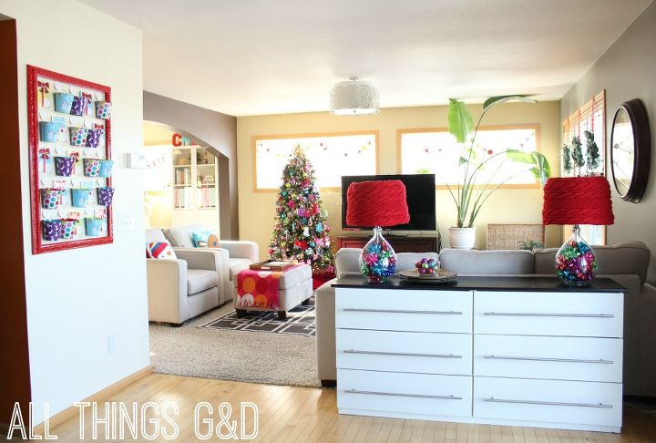 all things g d 2013 holiday home tour, christmas decorations, crafts, repurposing upcycling, seasonal holiday decor, A look into our living room from the kitchen and my daughter Kate s Christmas Countdown DIY Advent Calendar on the wall