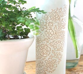 recycle a wine bottle into a pretty vase, crafts, repurposing upcycling, Use intricate stencils to add a design to your bottle