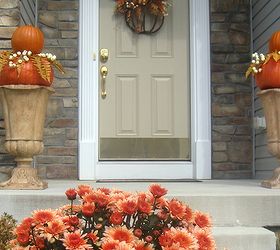 mums in a boot, gardening, repurposing upcycling, seasonal holiday decor, and secured in urns on either side of my front doorway