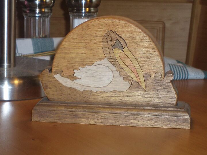 trabalhos manuais, Este um quebra cabe a de pelicano de madeira