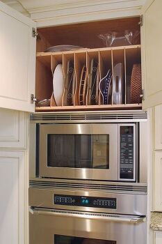 project case study kitchen renovation from 80 s to now, doors, home improvement, kitchen design, kitchen island, Most efficient use of space for long narrow equipment such as trays cookie sheets These dividers allow great organization for a variety of equipment All within easy reach 2013 Photography by JSPhotoFX