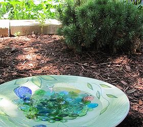 how to make a birdbath from a large salad plate, gardening, How it looks in front of the little frog pond We used to have fish in there but now it s just frogs I like frogs so it s okay