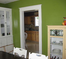q dining room help do you like this color at first she didn t but it s growing on, home decor, painting, What color would you paint this cream china cabinet She s thinking cobalt orange curtains