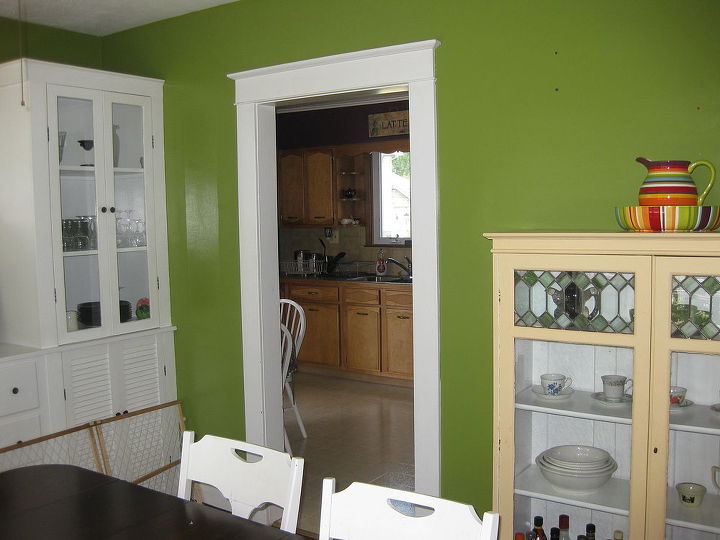 q dining room help do you like this color at first she didn t but it s growing on, home decor, painting, Paint ideas for the cream china cabinet