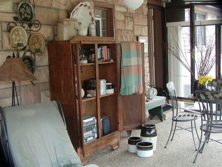 my three seasons porch decorated with mostly finds and vintage, outdoor living, repurposing upcycling, This is how most friends and family enter our home through the porch The cupboard purchased via a newspaper adv