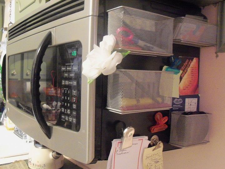organize your spices with magnetic spice jars, kitchen design, organizing, storage ideas, I got the idea from the little magnetic baskets and clips I had on the microwave and fridge