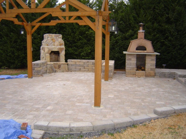 two year project in the foothills of north carolina featuring a roundboy wood fired, concrete masonry, decks, outdoor living, patio