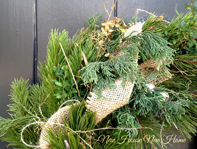 nature inspired holiday decor, christmas decorations, seasonal holiday decor, wreaths, Repeating the natural look by adding clippings and more burlap gives a store bought wreath a custom look