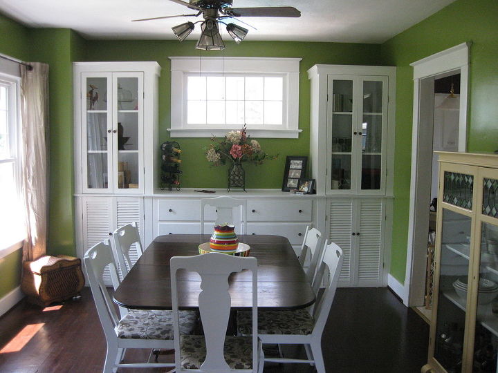 q dining room help do you like this color at first she didn t but it s growing on, home decor, painting, Opinions on wall color at first she didn t like but it s growing on her She wants to paint the cream cabinet on the right and update the beige curtains she s thinking cobalt and orange Any thoughts or suggestions