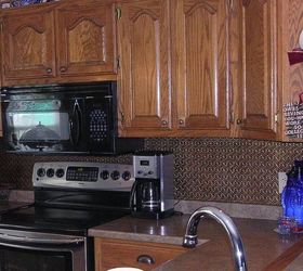 kitchen back splash easy do it your self project just glue up, kitchen backsplash, kitchen design, wall decor, Kitchen Back Splash in Rolls 2 feet x 25 feet PVC Design WC 20 Antique Copper Installed in Kitchen Just Plan Measure Cut with Scissors and Glue to most any clean smooth surface