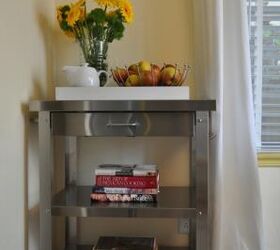 a fresh start for a breakfast nook, home decor, kitchen design, The wheeled Danver stainless steel professional kitchen cart featuring two shelves a front drawer and a side towel bar and hooks for utensils replaced an old style butcher block cart