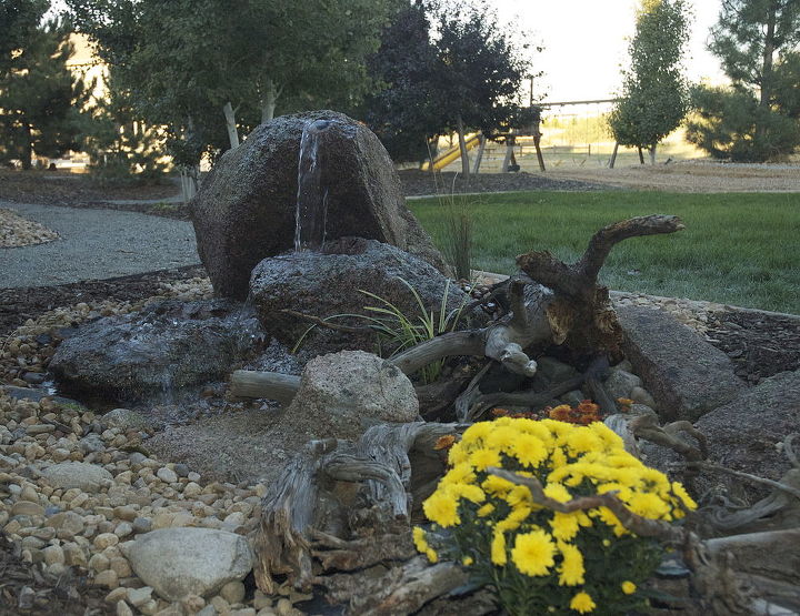 rocky mountain waterscape water feature, landscape, ponds water features, A Colorado spouting rock constructed with two drilled rocks and moss rock