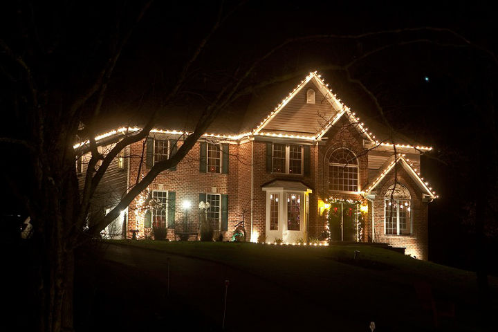 7 tips to hang holiday lights without damaging your home s exterior, christmas decorations, lighting, seasonal holiday decor