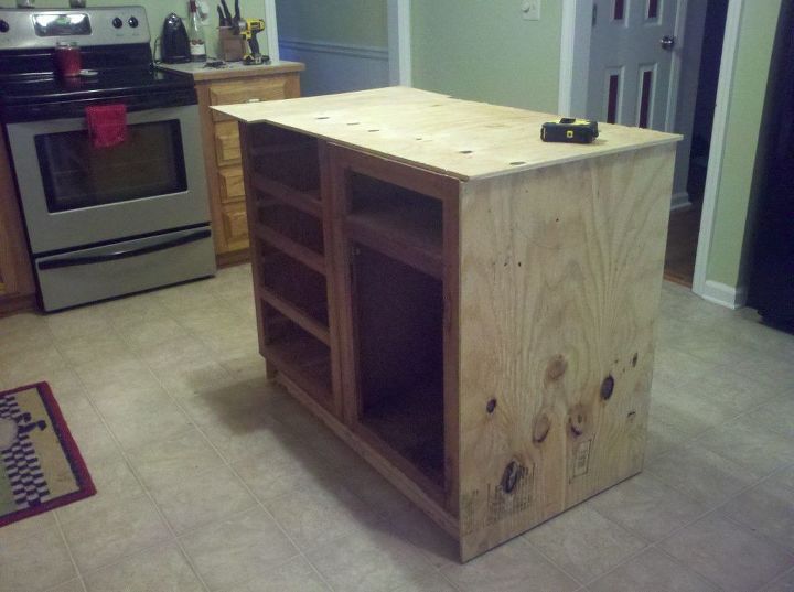 old base cabinets repurposed to kitchen island, I added plywood and connected the cabinets and made them the same height