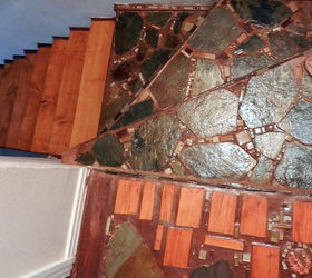 staircase project develops mind of it s own, concrete masonry, home decor, stairs, Staircase I hand formed all tiles from portland cement and carved with a dremel tool Stone work is standard patio stone combined with odds and ends in left over wood Risers combined with portland cement and nutmeg colored grout