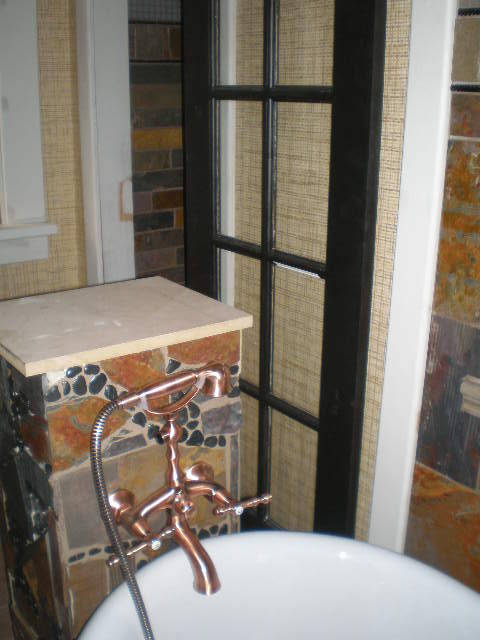 master bathroom, bathroom ideas, doors, home decor, later on i added a black glass tiled topper to the column