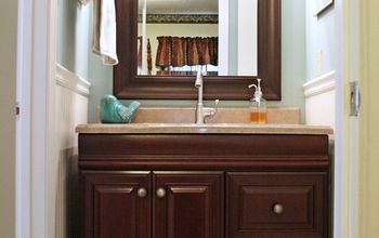 Sharing pics from my parent's 1970's bathroom renovation. Vanity, countertop, faucet, shower doors, beadboard wallpaper.