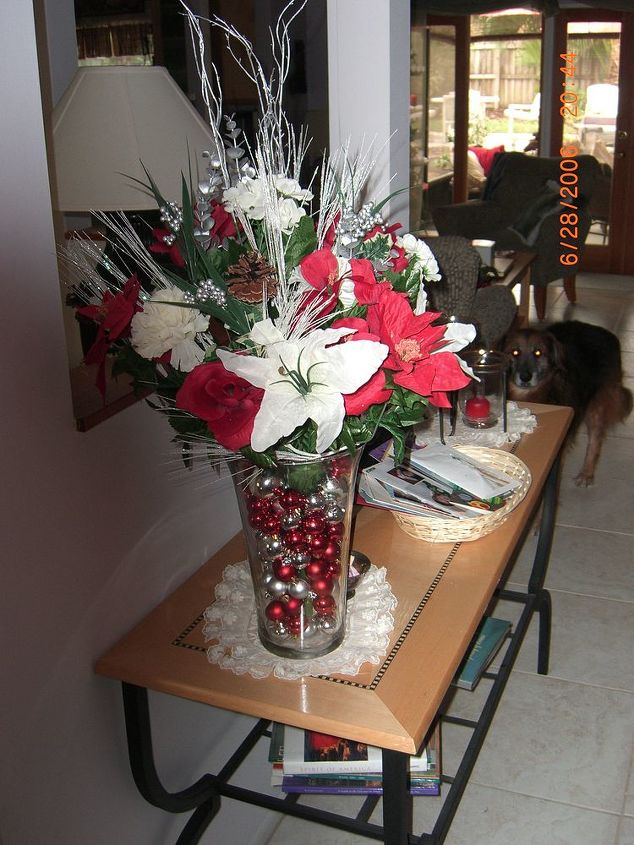 we did a red white and sliver christmas enjoy the color scheme throughout my home, christmas decorations, seasonal holiday decor, My entry table sets the stage