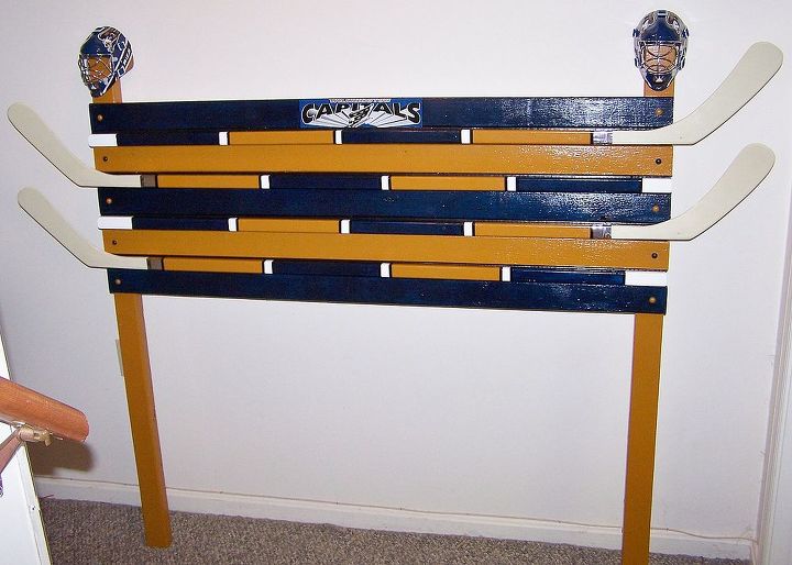 headboard for sports fan, bedroom ideas, home decor, Just used 2x4 s 2x3 s Bought the hockey sticks at the Sports Authority Used enamel paint auto detailing tape