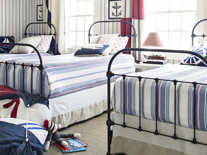 house tour righting the ship, home decor, Three iron beds allow the boys room to accomodate an overnight guest Striped blankets echo the wallpaper while framed anchor prints enhance the seafaring vibe Shop the boys room