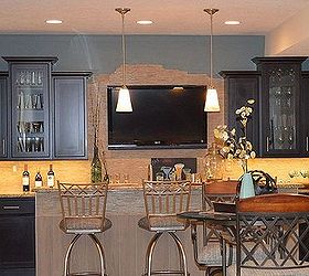 an entertaining basement remodel, basement ideas, entertainment rec rooms, home improvement, The maple cabinets with onyx finish anchor the space while the lighter finish on the island keeps the space from being too dark