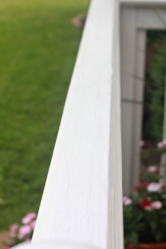 spring summer porch updates, chalkboard paint, crafts, curb appeal, seasonal holiday decor, wreaths, I gave the railings two coats of a white exterior paint primer in one in a semi gloss finish