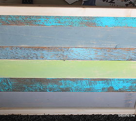 reclaimed wood bike art, crafts, home decor, woodworking projects, I joined the wood with 1x2 s I painted white