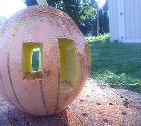 how to make a cinderella pumpkin coach, crafts, gardening, seasonal holiday decor, Then I sprinkled gold and copper glitter all over the glue