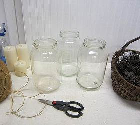 old pickle jars upcycled into pottery barn knockoffs, christmas decorations, repurposing upcycling, seasonal holiday decor, Using twine I had on hand I began wrapping it around the neck of a wide mouthed gallon size pickle jar I glued it periodically with a hot glue gun as I wrapped it around the jar