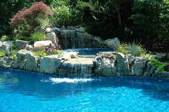 backyard retreat that is in keeping with natural surroundings, landscape, outdoor living, perennial, ponds water features, pool designs, spas, Waterfall spiling into spa acts as massage