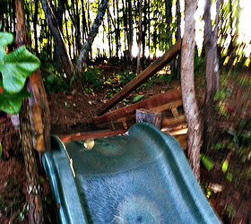 diy make a slide in the hill side or yard easy fun for the kids, diy, outdoor living, repurposing upcycling, woodworking projects, We made this slide with scrap wood the cost of a used slide 25 bought on Craigslist Follow these steps to make your own If you have a hillside in the back yard this is perfect yourmodernfamily com